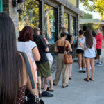 People lined up for a record release listening party at Armadillo Music in Davis