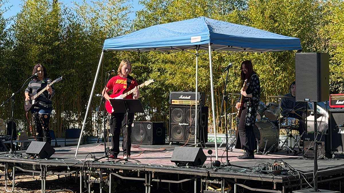 RockBand University student musicians performing in Halloween costumes at Sudwerk in Davis